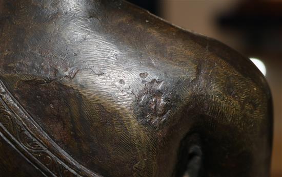 A large Tibetan bronze seated figure of Buddha Shakyamuni, probably 13th century, height 39.5cm, minor old repairs